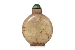 A PALE-GREEN AND RUSSET JADE SNUFF BOTTLE