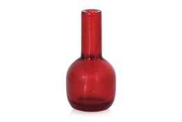 A SMALL RUBY-RED PEKING GLASS BOTTLE VASE