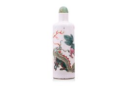 A FAMILLE ROSE PORCELAIN 'BUDDHIST LIONS' SNUFF BOTTLE