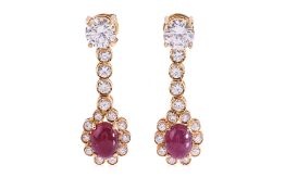 A RUBY CABOCHON AND DIAMOND EARRINGS