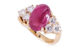 A RUBY CABOCHON AND DIAMOND RING