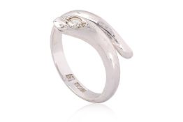 A DIAMOND 'SERPENT' PLATINUM RING