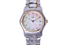 AN EBEL LADY'S 1911 STAINLESS STEEL AND GOLD BRACELET WATCH