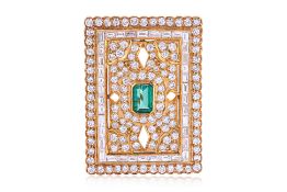 AN EMERALD AND DIAMOND PENDANT BROOCH