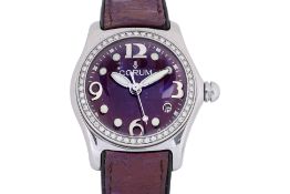 A CORUM LADY'S 'BUBBLE' STAINLESS STEEL AND DIAMOND WATCH