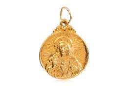 A HIGH KARAT GOLD 'JESUS CHRIST' PENDANT