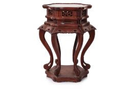 A HEXAGONAL ROSEWOOD STAND