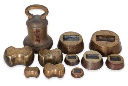 A GROUP OF ASSORTED BRASS WEIGHTS
