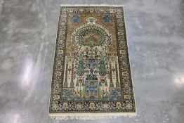 A MIDDLE EASTERN WOOL PRAYER RUG