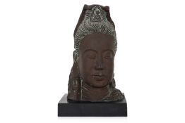 A BRONZE HEAD OF GUAN YIN