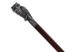 A SILVER OWL WALKING CANE