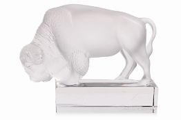 A LALIQUE GLASS BISON PAPERWEIGHT