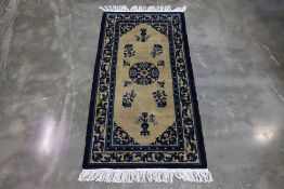 A CHINESE CREAM GROUND NINGXIA RUG