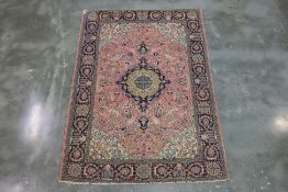 A PINK GROUND MEDALLION SILK RUG