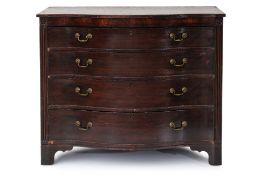 A GEORGE III MAHOGANY SERPENTINE-FRONTED CHEST OF DRAWERS