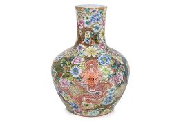 A LARGE FAMILLE ROSE MILLEFLEURS DRAGON BOTTLE VASE