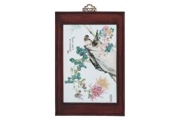 A CHINESE FAMILLE ROSE PORCELAIN PLAQUE