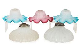 A GROUP OF FIVE ASSORTED GLASS SHADES