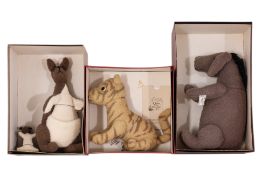 A GROUP OF THREE R. JOHN WRIGHT WINNIE-THE-POOH DOLLS
