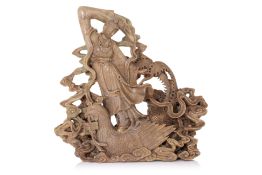 A CARVED SOAPSTONE GROUP OF A LADY RIDING A PHOENIX