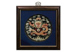 A CHINESE EMBROIDERED SILK DRAGON PANEL