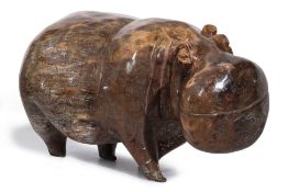 A LARGE CARVED WOOD MODEL OF A HIPPO