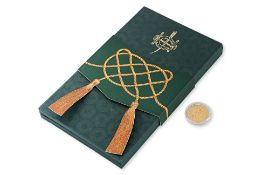 A HONG KONG JOCKEY CLUB COMMEMORATIVE GOLD YEAR OF THE DOG MEDALLION