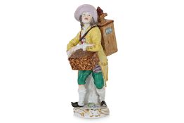 A MEISSEN 'CRIE DE PARIS' PORCELAIN FIGURE