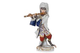 A MEISSEN MONKEY MUSICIAN PORCELAIN FIGURE