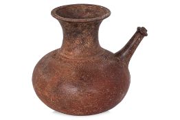 A SOUTHEAST ASIAN EARTHENWARE KENDI