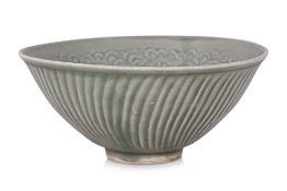 A MOULDED CELADON CHRYSANTHEMUM BOWL