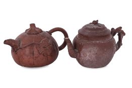 TWO YIXING POTTERY TEAPOTS WITH COVERS