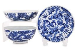 THREE BLUE AND WHITE PORCELAIN 'BLEU DE HUE' DRAGON DECORATED ITEMS