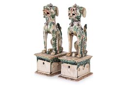 A PAIR OF VIETNAMESE STONEWARE NGHE STATUES