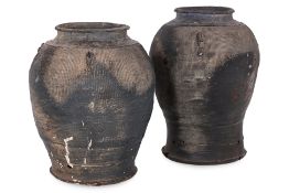 A PAIR OF UNGLAZED STONEWARE JARS