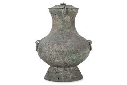 A SINO-VIETNAMESE BRONZE HU VASE AND COVER