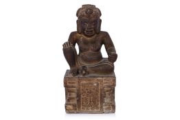 A VIETNAMESE CARVED STONE STATUE