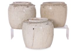A GROUP OF THREE VIETNAMESE WHITE GLAZED JARS