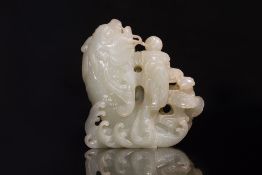 A PALE CELADON JADE CARP VASE