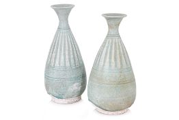 TWO SIMILAR THAI CELADON PEAR SHAPED BOTTLE VASES