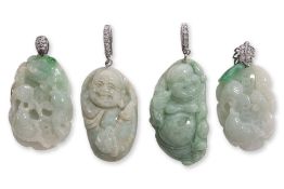 A GROUP OF FOUR BURMESE GREEN JADEITE PENDANTS