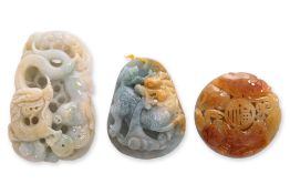 A GROUP OF THREE BURMESE JADEITE PENDANTS