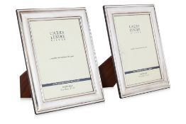 A PAIR OF SILVER PHOTOGRAPH FRAMES