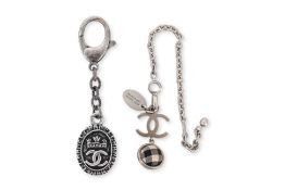 A PAIR OF CHANEL KEY RINGS