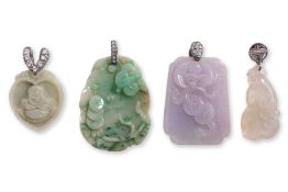 A GROUP OF FOUR BURMESE JADEITE PENDANTS