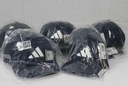 Five Adidas Tour snapback golf caps in navy and wh