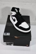 An as new pair of Nike Air Jordan 1 Mid SE in Diam