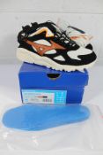 A pair of boxed as new Mizuno Sky Medal Patta Road