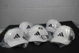 Five Adidas Tour snapback golf caps in white and b