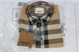 An as new Burberry Kids Baby Boys Mini Owen Short